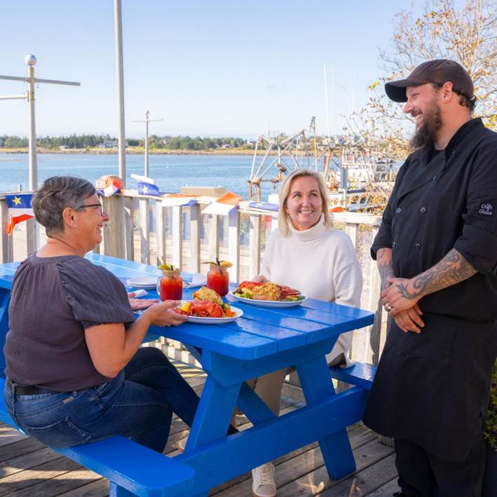 A person pulling a group of dogs

AI-generated content may be incorrect.